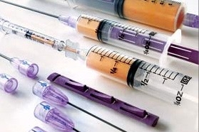 Illustrative image of syringes used for removal of fat via liposuction, fat grafting to the buttocks, and other plastic surgery procedures.